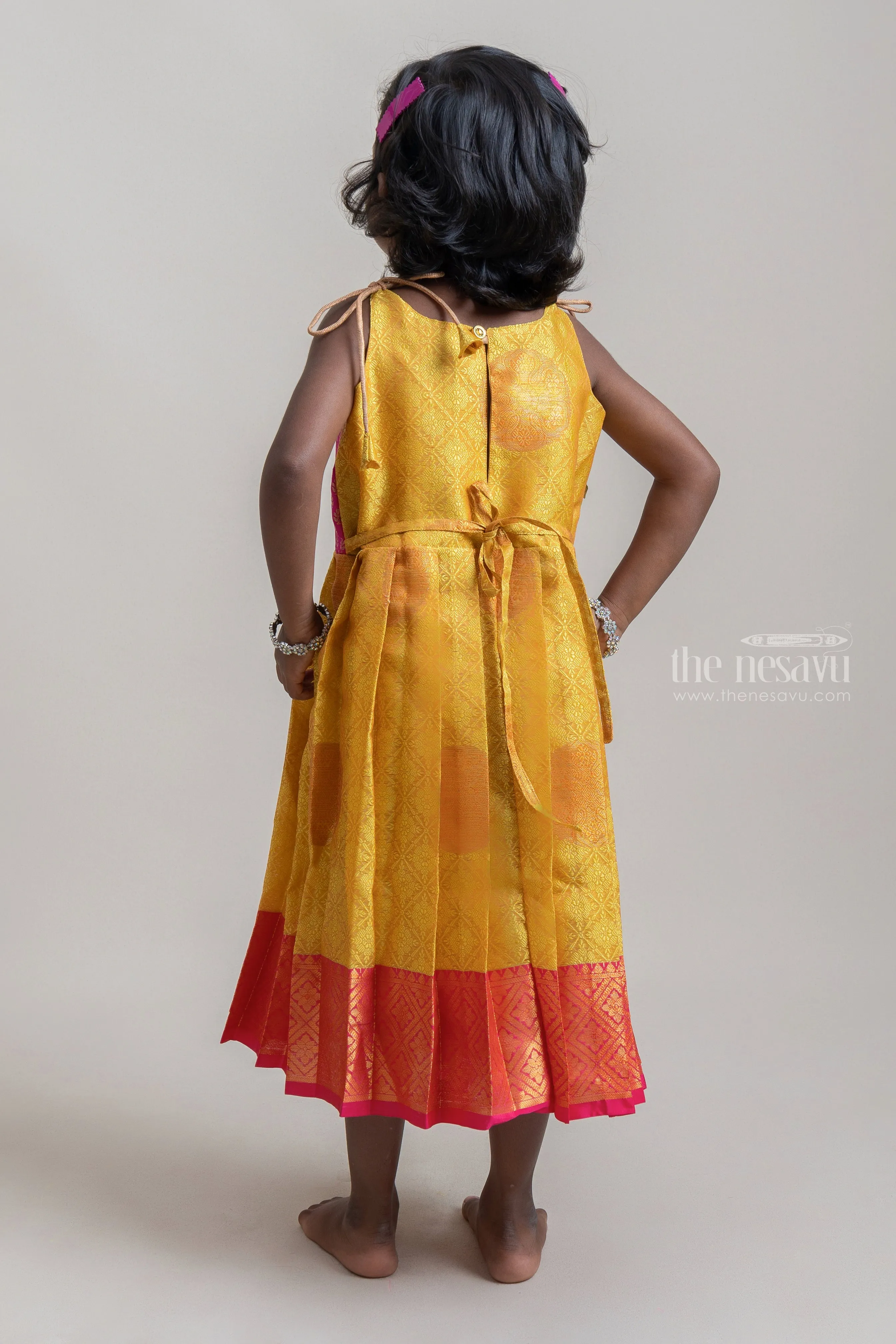 Bright Yellow With Pink Semi-Kanchipuram Silk Tie-Up Frock For Baby Girls